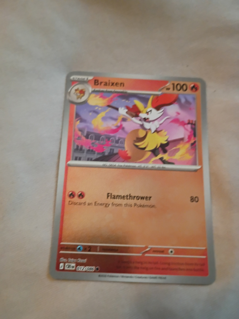 Pokemon Braixen Card - Orange and Yellow Artwork